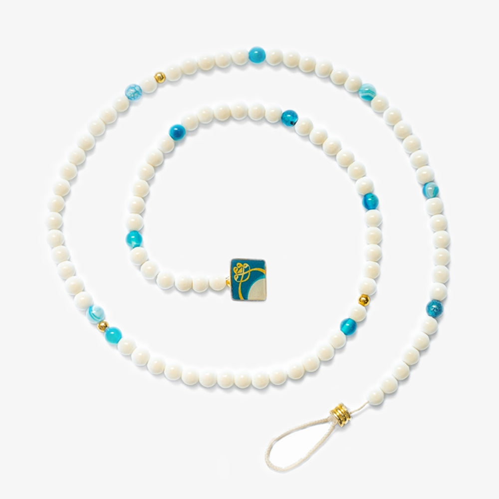 Unveil a symbol of elegance with our Camel Bone & Apatite Gemstone Tasbih Bracelet, adorned with silver accents. A masterpiece of craftsmanship, it stands as a beacon of wisdom and spiritual resilience.