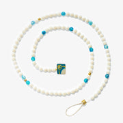 Unveil a symbol of elegance with our Camel Bone & Apatite Gemstone Tasbih Bracelet, adorned with silver accents. A masterpiece of craftsmanship, it stands as a beacon of wisdom and spiritual resilience.