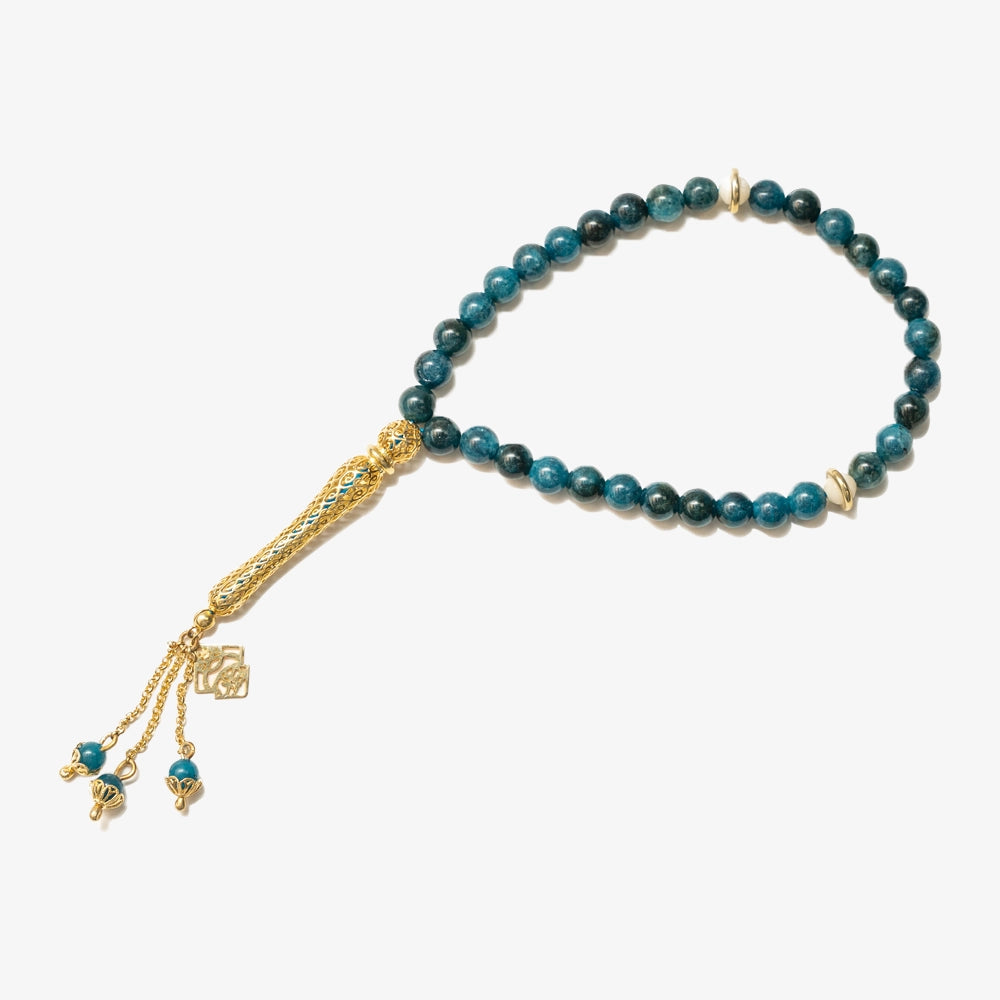 Unveil the essence of spiritual elegance with our Apatite Gemstone & Camel Bone Tasbih, adorned with 9.64g of intricate silver. A talisman for communication and creativity, it's a blend of tradition and symbolic depth