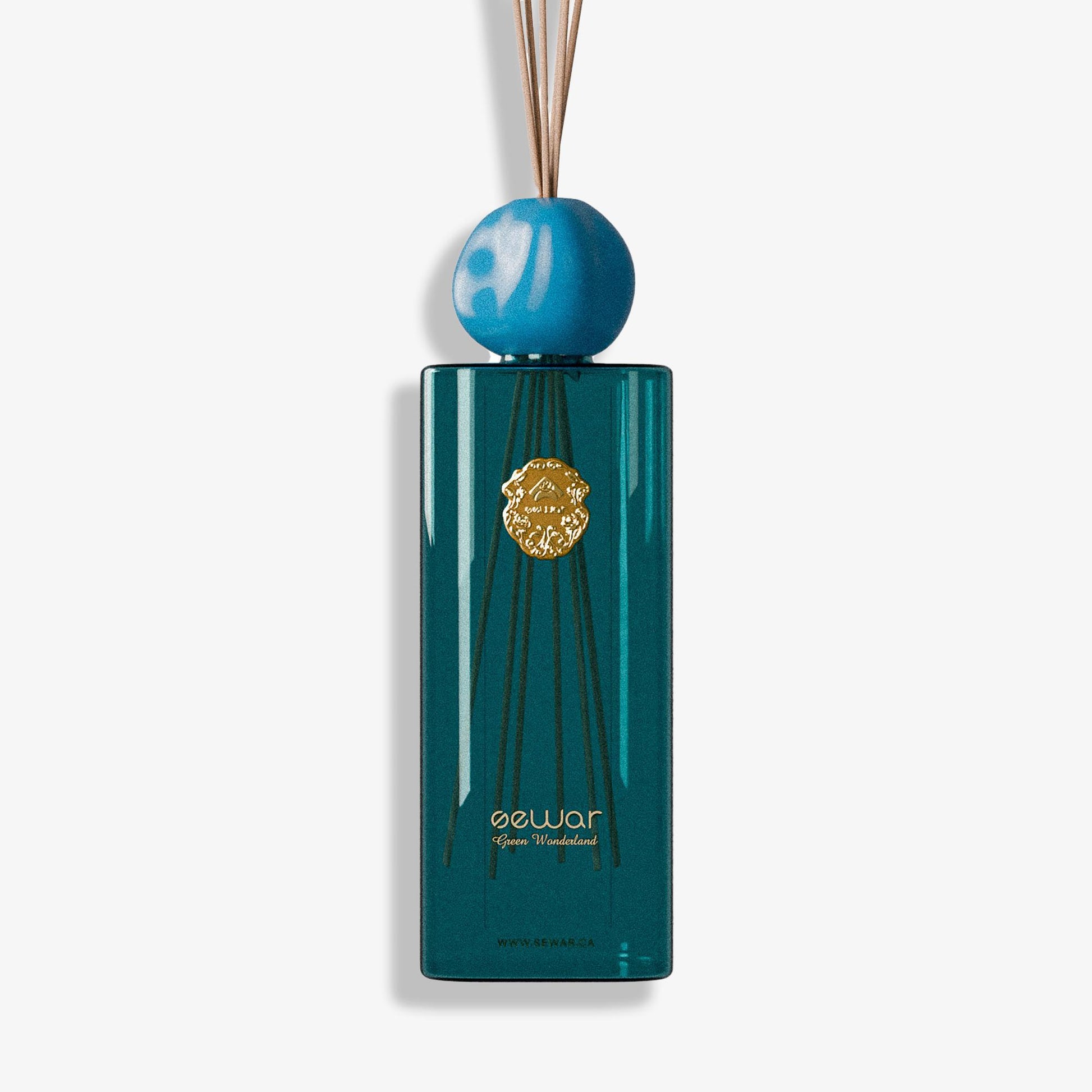 Sewar Green Wonderland Reed Diffuser in a 500ml luxurious glass bottle. Adorned with an elegant metallic logo, this diffuser delivers a sophisticated fragrance blend of jasmine, tuberose, and powdery accords. Its generous size ensures a long-lasting aroma, filling your home with an inviting and refined scent experience. Perfect for adding a touch of luxury and freshness to any room.