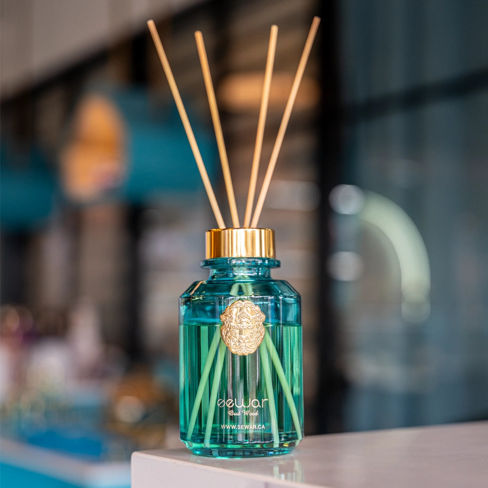 Transform your space with the Sewar Oud Wood Reed Diffuser.