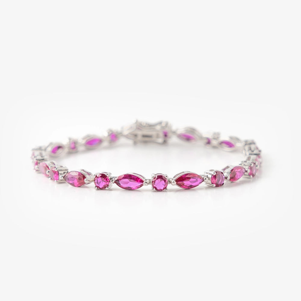 Discover timeless elegance with our sterling silver tennis bracelet, featuring rhodium and sparkling cubic zirconia. Meticulously crafted with attention to detail, itās the perfect accessory for any occasion.