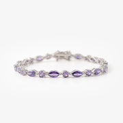 Experience timeless elegance with our sterling silver tennis bracelet, featuring rhodium and cubic zirconia. Meticulously crafted with intricate detail, it’s the perfect accessory for any occasion.