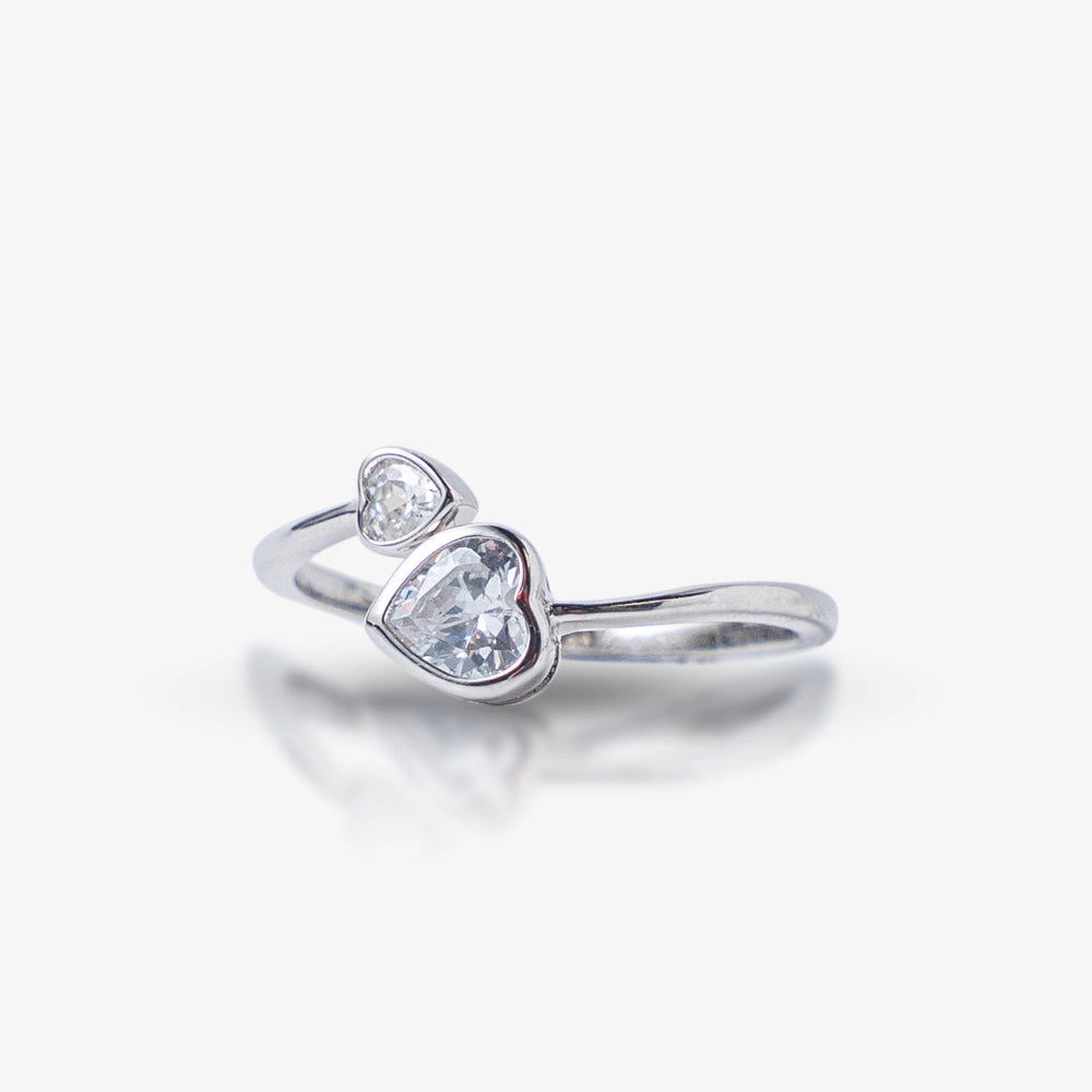 Delicate and romantic, this Sterling Silver 925 Heart Open Ring features two sparkling heart-shaped stones, creating an elegant and timeless design. The open-style band adds a modern touch, making it a perfect everyday accessory.