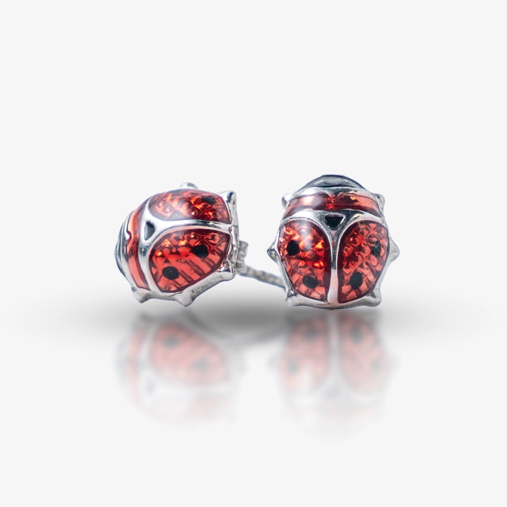 Add a playful touch to your style with these Sterling Silver 925 Red Ladybug Stud Earrings. Featuring a charming ladybug design with vibrant red stones, these earrings bring a unique and fun flair to any outfit
