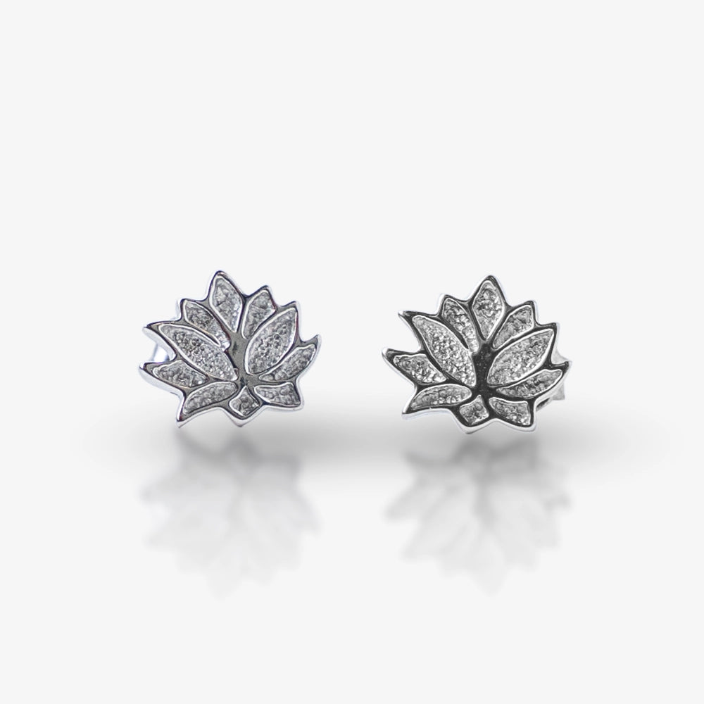 Inspired by natureās elegance, the Silver Lotus Bloom Stud Earrings are a symbol of grace and beauty. Crafted in 925 sterling silver, these intricately designed lotus-shaped studs feature a subtle textured finish, adding a modern yet timeless touch to your jewelry collection. Perfect for everyday wear or special occasions.