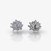 Inspired by nature’s elegance, the Silver Lotus Bloom Stud Earrings are a symbol of grace and beauty. Crafted in 925 sterling silver, these intricately designed lotus-shaped studs feature a subtle textured finish, adding a modern yet timeless touch to your jewelry collection. Perfect for everyday wear or special occasions.