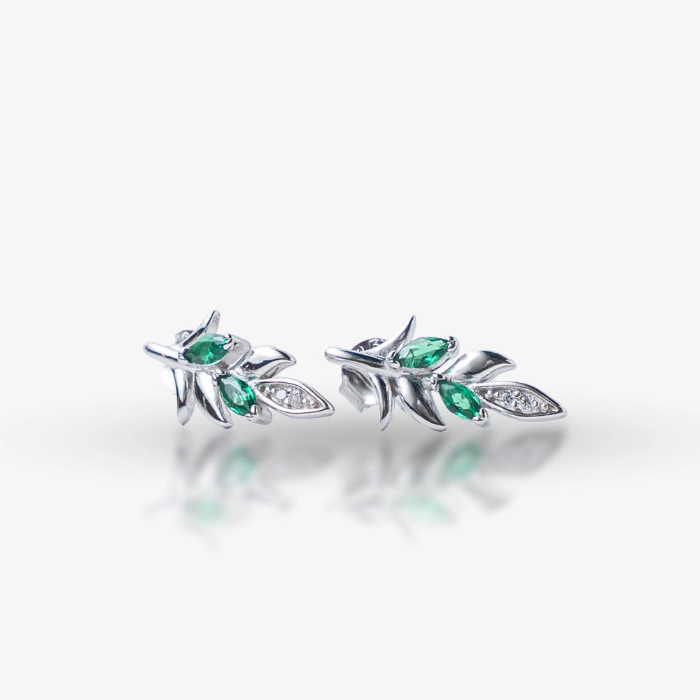 Elegant and stylish, these Sterling Silver 925 Green Leaf Stud Earrings feature a delicate leaf design with green and white stones for a touch of sparkle.