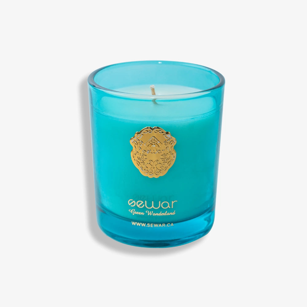 Green Wonderland Scented Candle with jasmine, tuberose, and powdery accords in an elegant 200g glass jar for a luxurious floral fragrance.