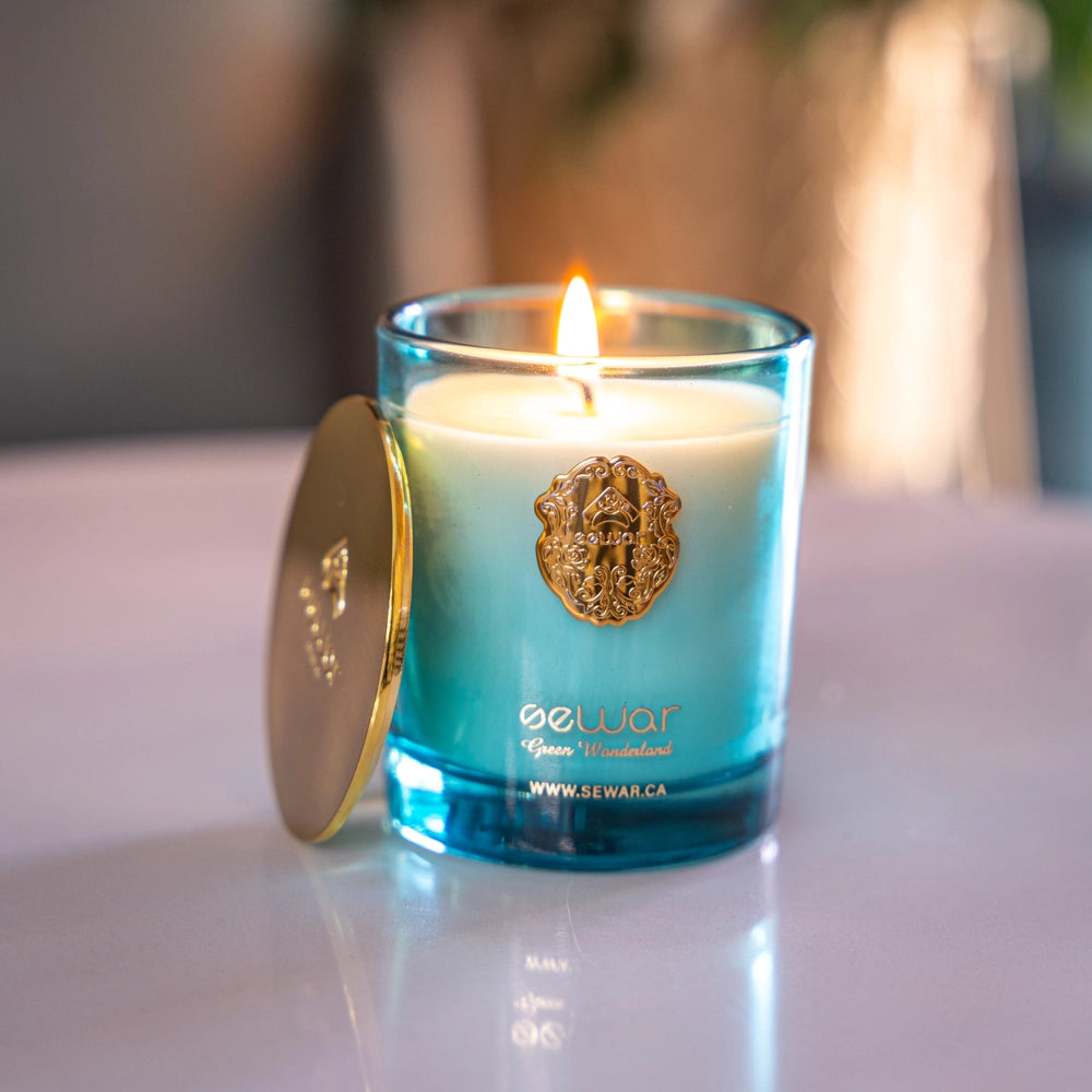 Green Wonderland Scented Candle with jasmine, tuberose, and powdery accords in an elegant 200g glass jar for a luxurious floral fragrance.