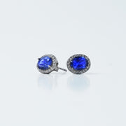 Add a touch of timeless luxury to your jewelry collection with these stunning Sapphire Elegance Silver Stud Earrings. Crafted in 925 sterling silver, they feature radiant blue sapphire-hued gemstones surrounded by a delicate halo of shimmering stones. Perfect for elevating any look, these earrings blend classic sophistication with modern charm.