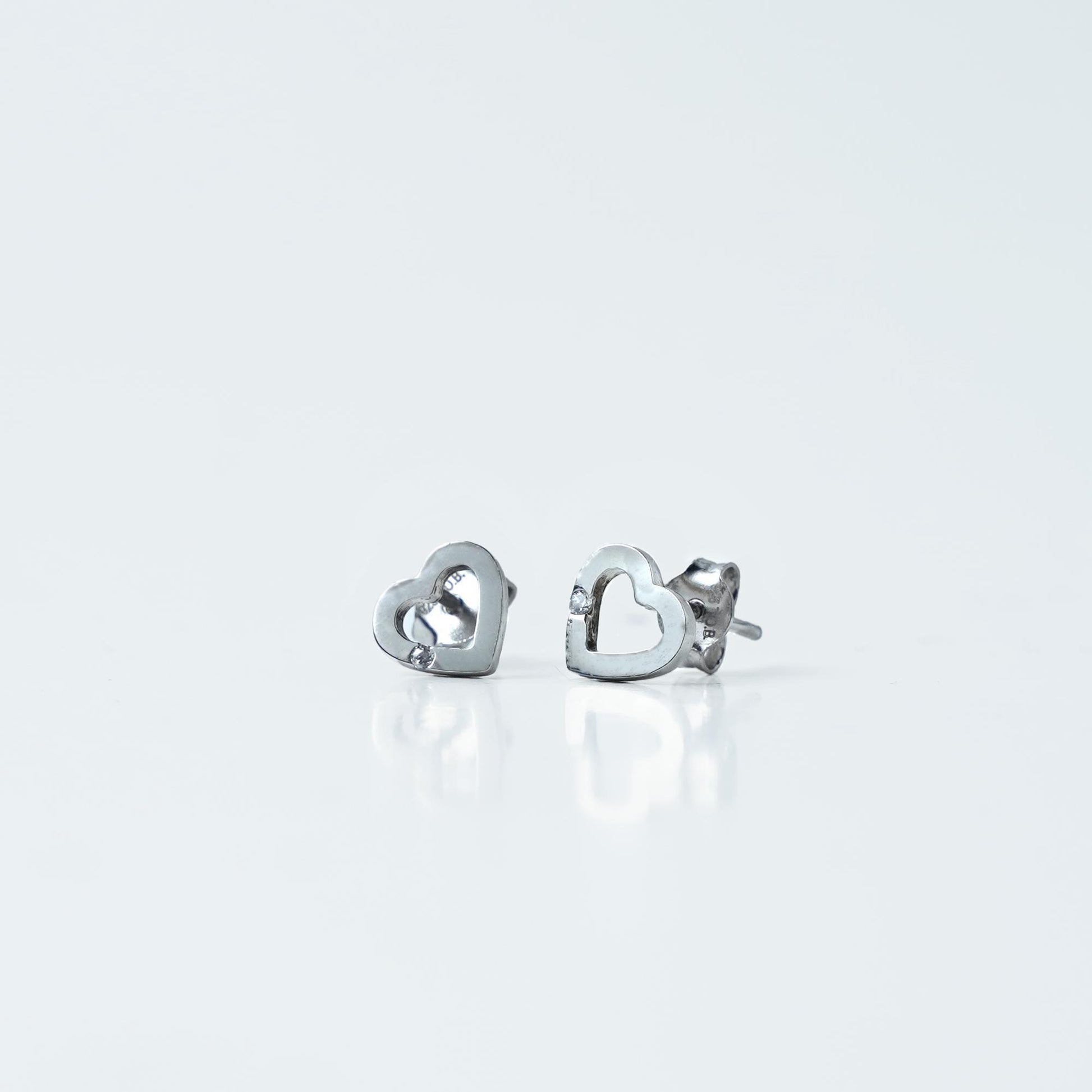 Simple and elegant, these Sterling Silver 925 Open Heart Stud Earrings are perfect for adding a touch of charm to any outfit. The delicate heart-shaped design offers a timeless and minimalistic look.